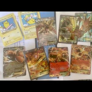 9 Pokémon cards from evolutions XY series 3 Charizard EX +4 other EX+ 2 Pikachu